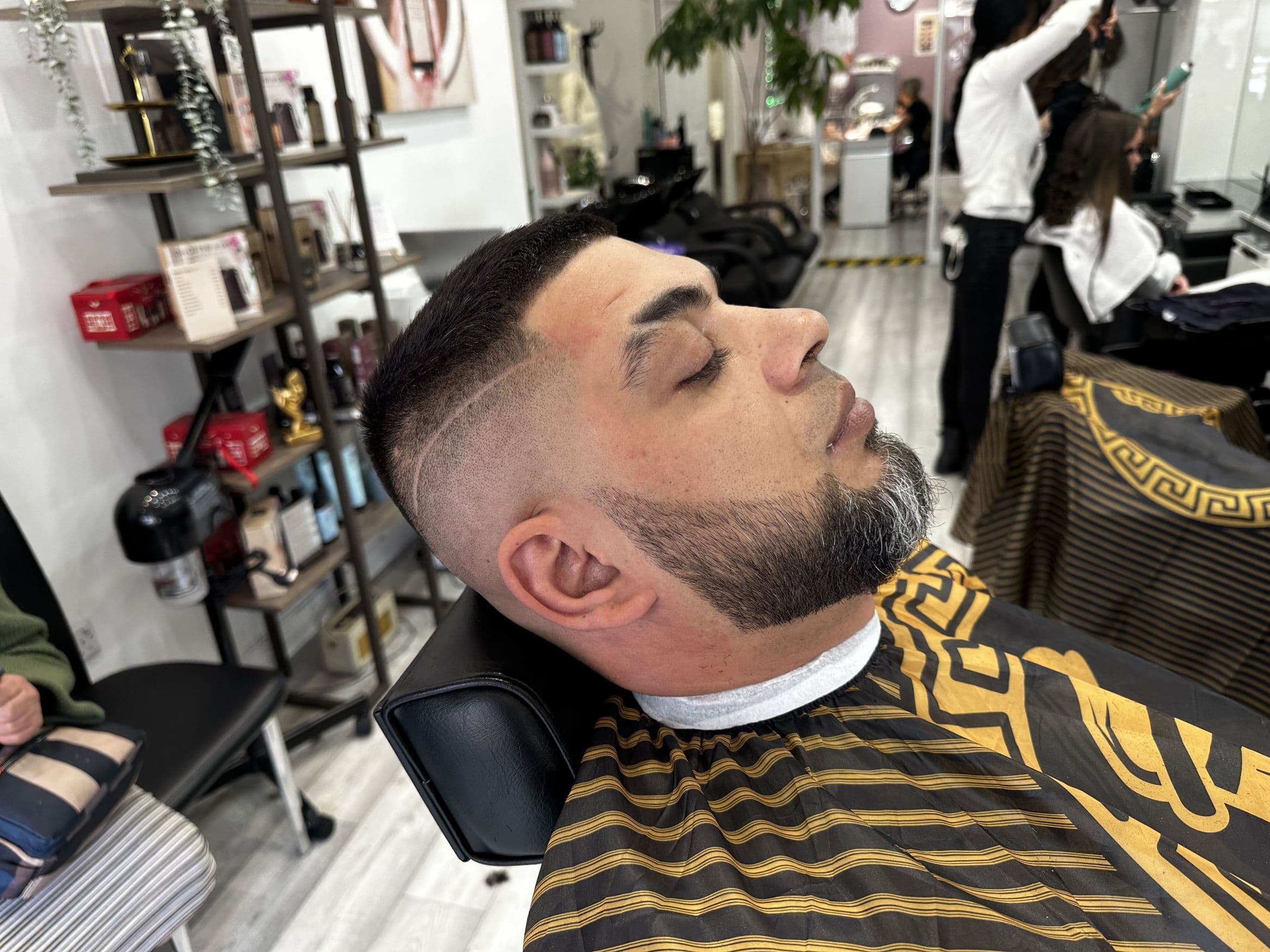 Clean skin fade and beard shape-up by KD Barbers